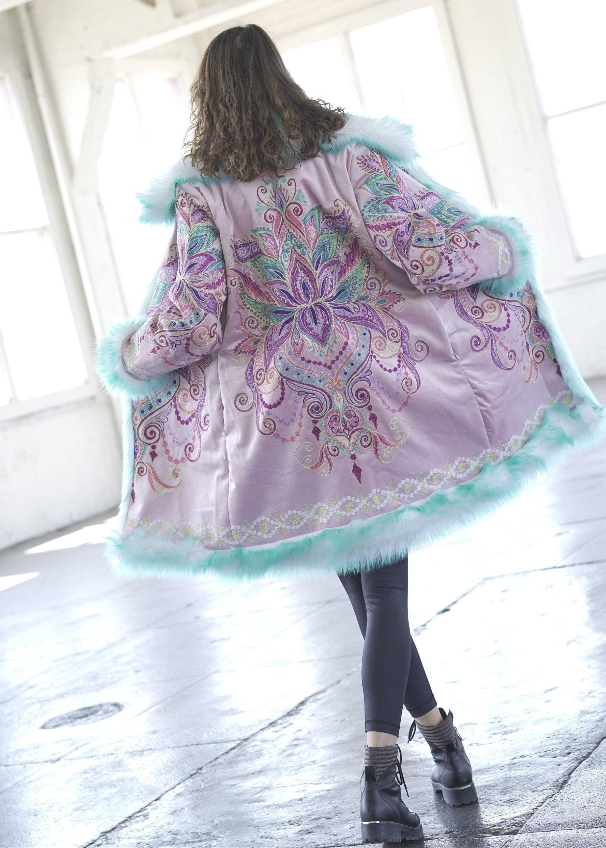 Woman wearing a colorful embroidery coat