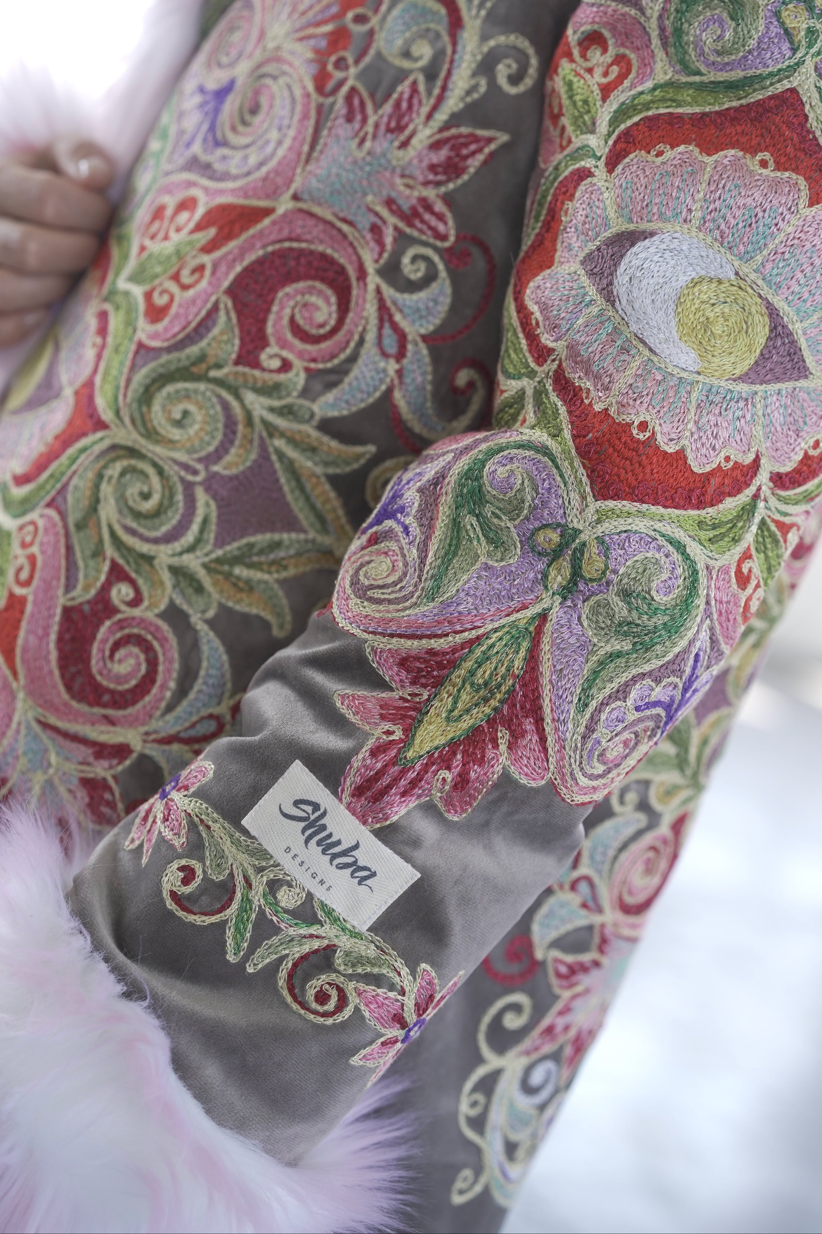 Red Flower pink faux fur festival jacket with handcrafted embroidered details